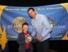 Nathan Ogbourne receives the SW U10 Football Shield from Club – School Liaison Officer Paul Doherty